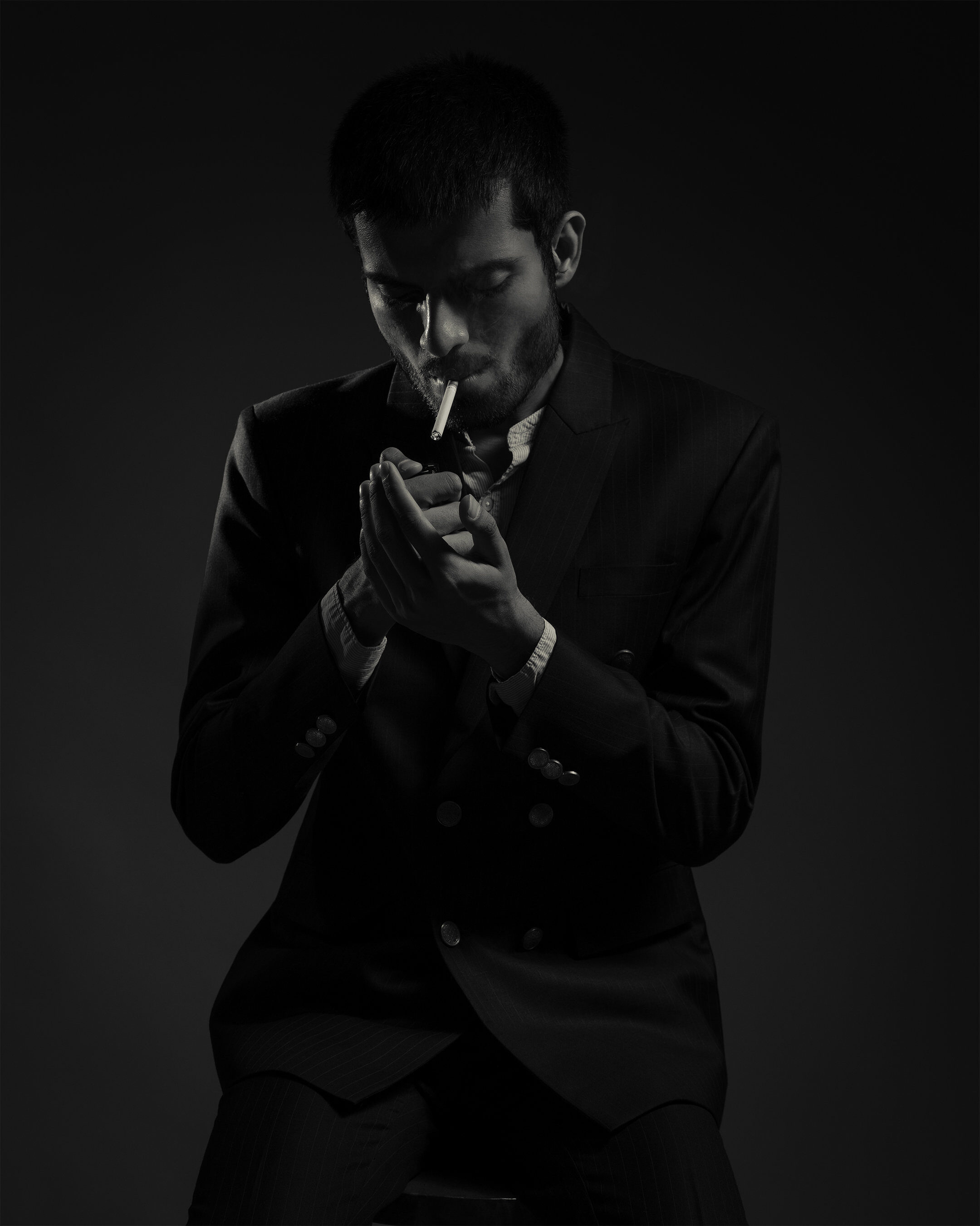 Male portrait — dark dramatic B&W suit