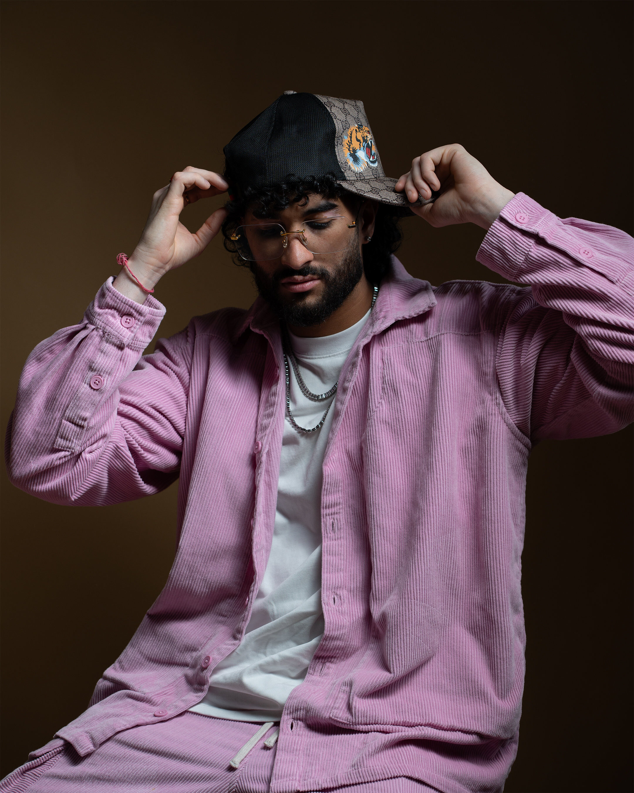 Male fashion portrait — pink streetwear full length