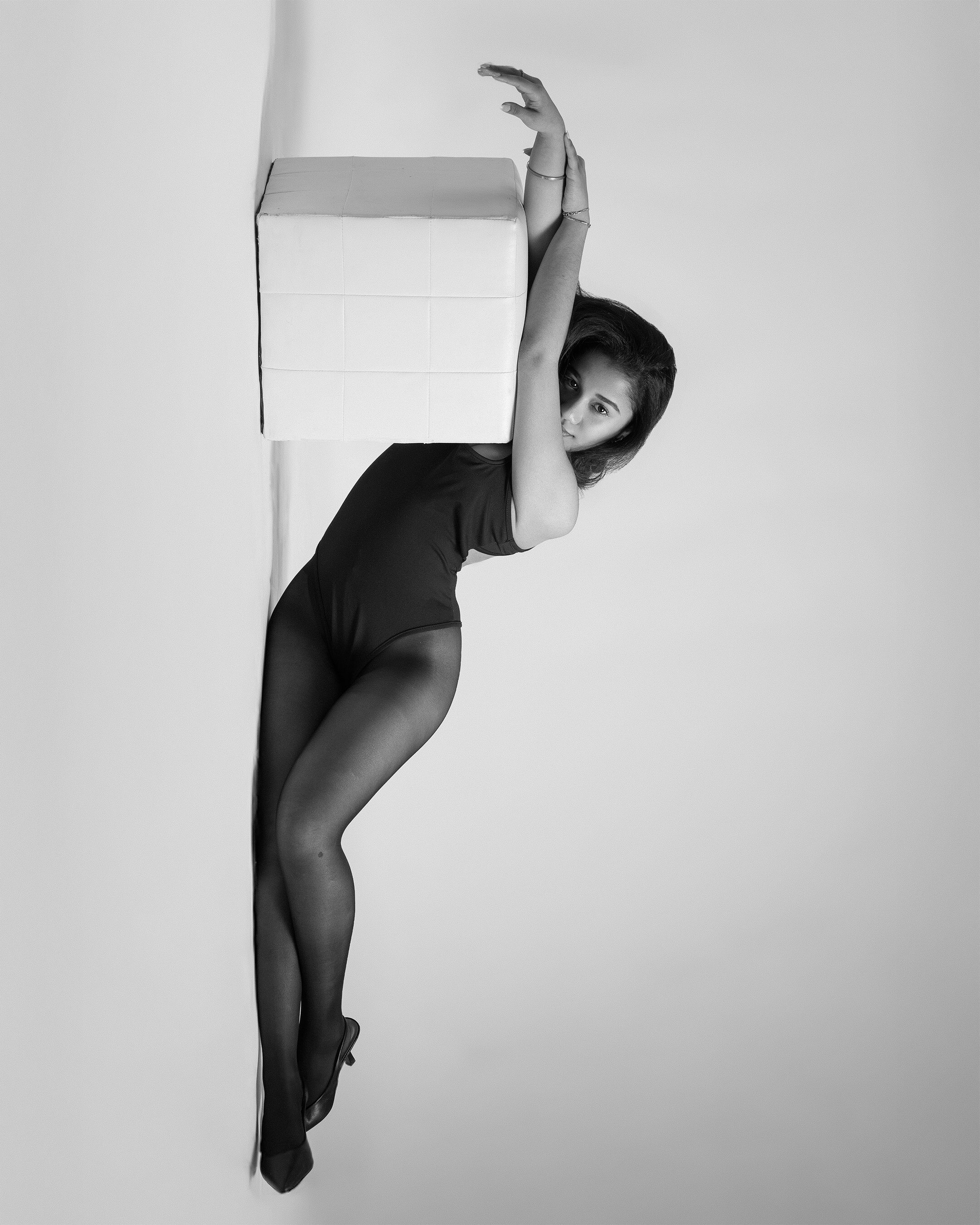 Studio portrait — B&W corner creative pose