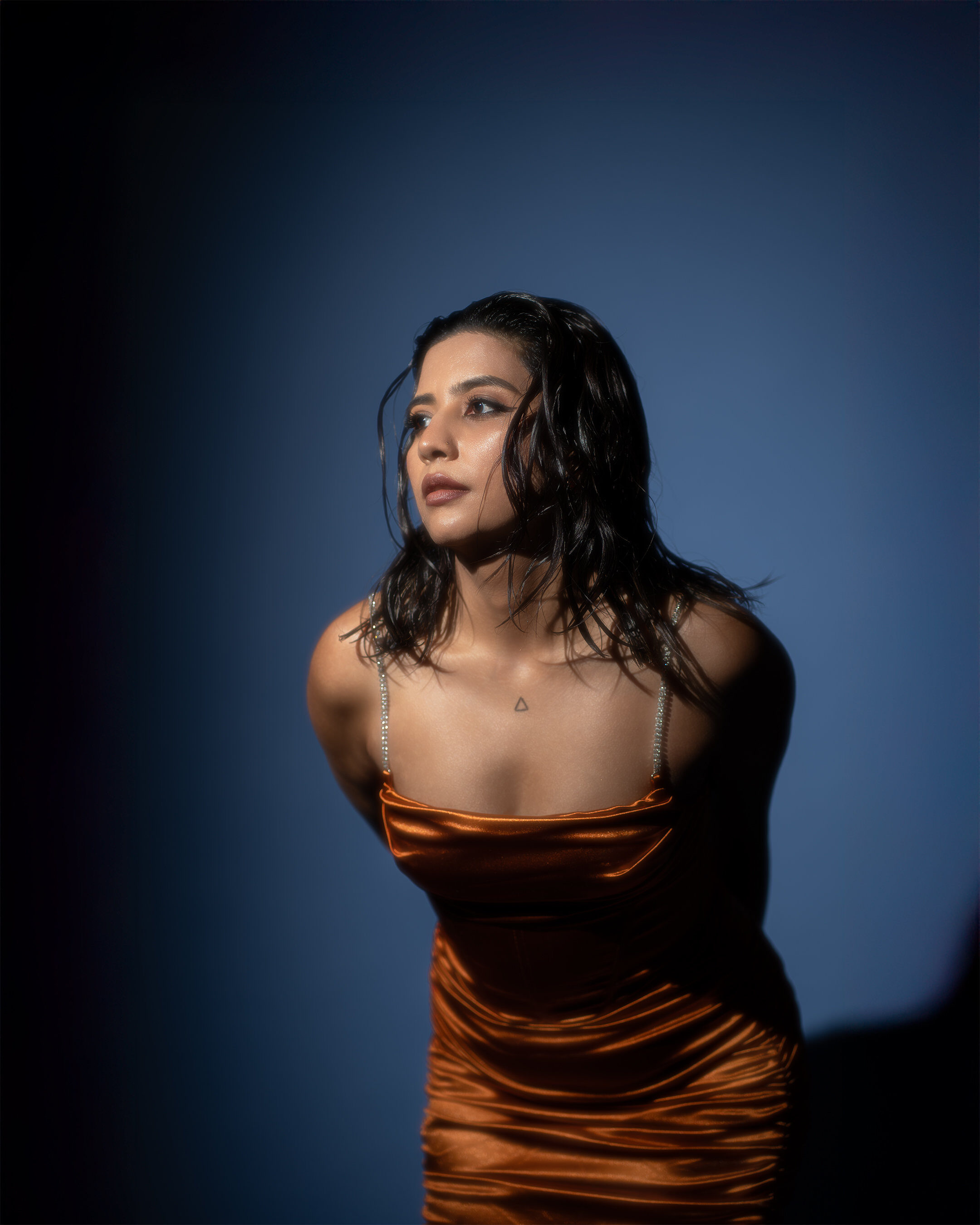 Editorial portrait — blue and copper wet hair